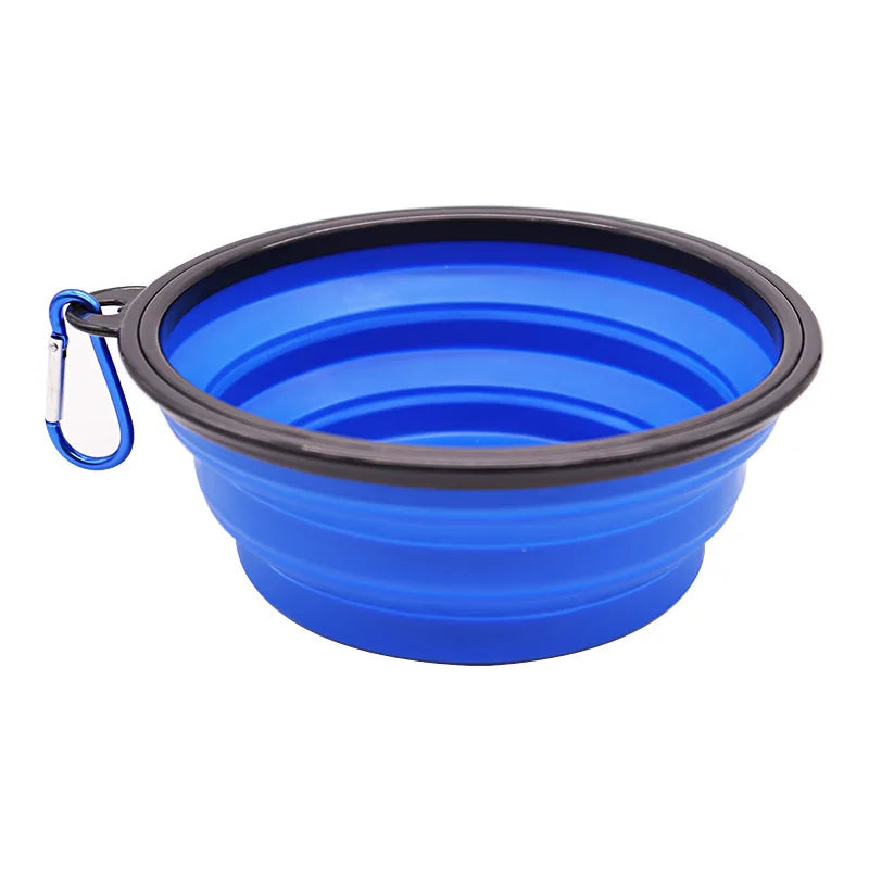 Portable silicone dog feeder bowl with dispenser and carabiner, suitable for travel, food, and water for dogs and cats.