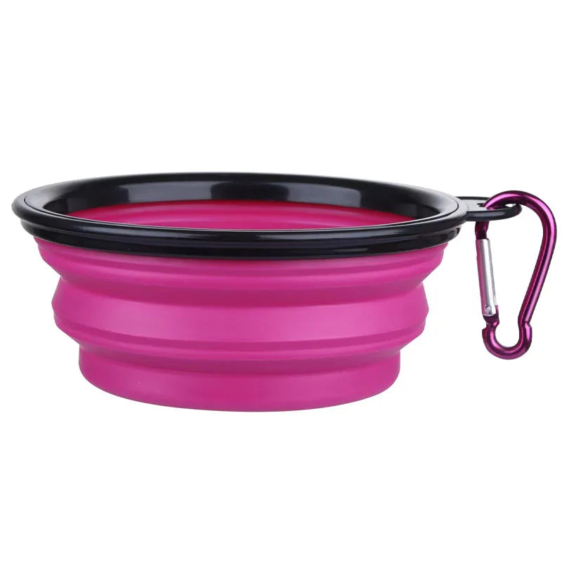 Portable silicone dog feeder bowl with dispenser and carabiner, for travel food and water for pets.
