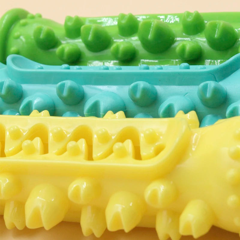 A minha loja dog toothbrush chew toy stick made of soft rubber with molar ridges, designed for small dogs' interactive chewing and food play.