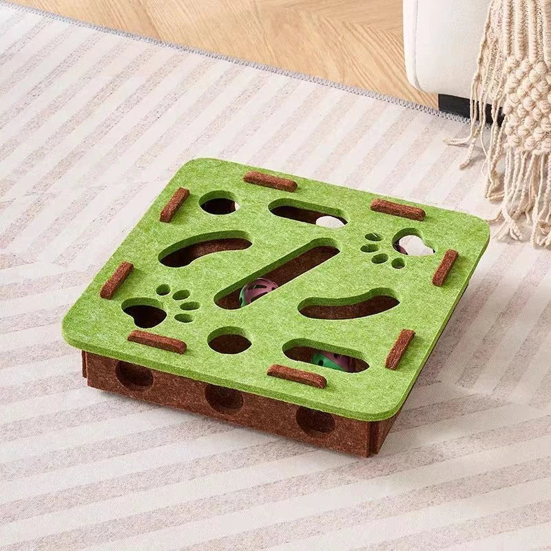 Felt cat puzzle feeder box with three balls, interactive maze toy for indoor cats, promoting mental enrichment and treat hiding.